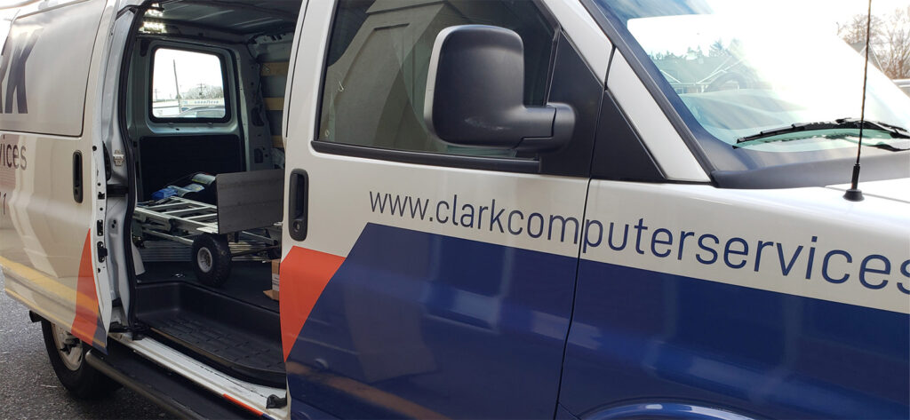 CLARK Computer Services branded van equipped for technology moving